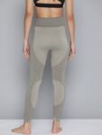 216e29a6-7afe-40c6-9b1c-d634384be5fd1695124988636-HRX-By-Hrithik-Roshan-YOGA-WOMEN-BRINDLE-RAPID-DRY-SOLID-TIG-2