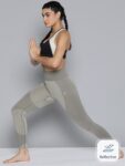 216e29a6-7afe-40c6-9b1c-d634384be5fd1695124988636-HRX-By-Hrithik-Roshan-YOGA-WOMEN-BRINDLE-RAPID-DRY-SOLID-TIG-2