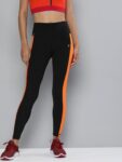 c50359c7-58a7-4e1b-bdae-bc4176afb55f1647948367129-HRX-by-Hrithik-Roshan-Women-Black–Orange-Solid-Running-Tigh-2
