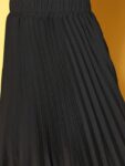 5843ede3-4b41-4647-b1ae-55c4a621b58f1668603675869-Berrylush-Black-Solid-Accordion-Pleats-Flared-Skirt-78416686-1