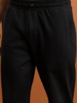 dc601bb5-d73c-4851-9ba6-b92575231d7f1705995358914HighlanderMenBlackRelaxedStraightFitTrackPant3