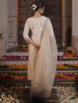 35e138c4-d1a4-4394-9475-dea88bdc75ca1727720523672-Indo-Era-Women-Floral-Embroidered-Regular-Liva-Kurta-with-Tr-2 (1)