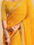 imgi_10_d5309c05-7c03-4025-b2a4-b402b4dacfdd1710791607741KaliniYellowGeorgetteEthnicZariEmbroideredFestiveSareewithMa1
