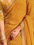 imgi_26_b5d0f04e-d109-4cca-96b9-a0a6db9b32661710791611796KaliniMustardGeorgetteEthnicZariEmbroideredFestiveSareewithM1